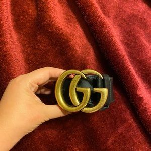 Gucci black with gold belt